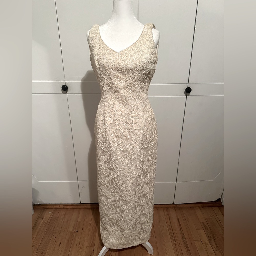 One of a kind wedding dress worn once with veil